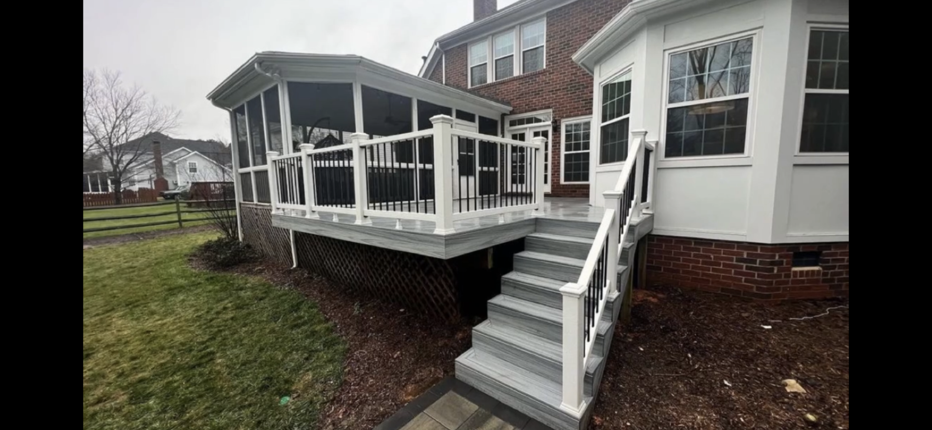 Deck with new trex boards, handrail, and stairs